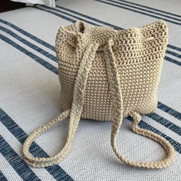 Cream crochet bucket backpack bag